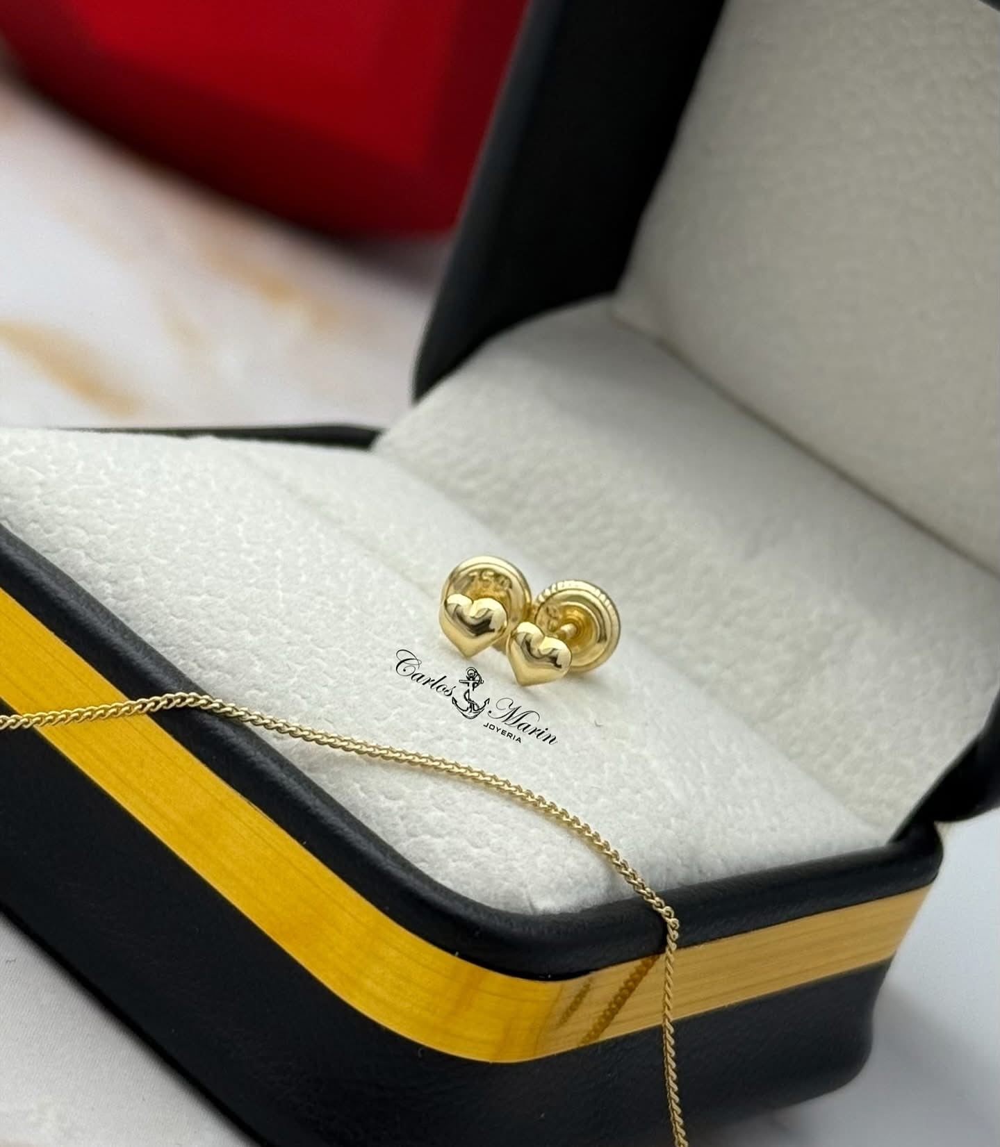 Aretes de corazón oro 18k